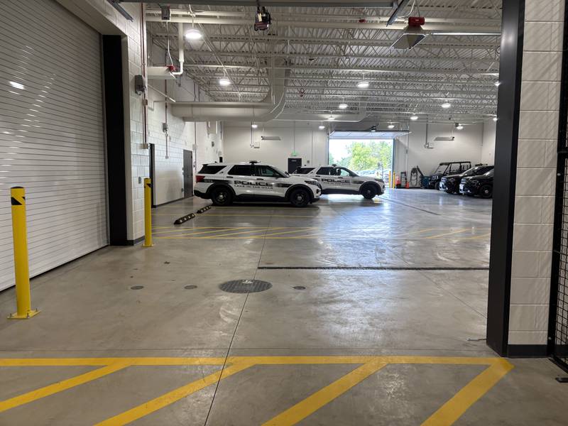 A squad car pulls into the garage at the Lake in the Hills Police Department Wednesday, May, 20, 2026.