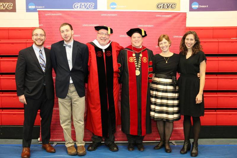 Jim Healy is seen with David J. Livingston, president of Lewis University, Healy's wife, Madonna Wotjtaszek-Healy, and three of Healy's four children, Kevin, Daniel and Claire.