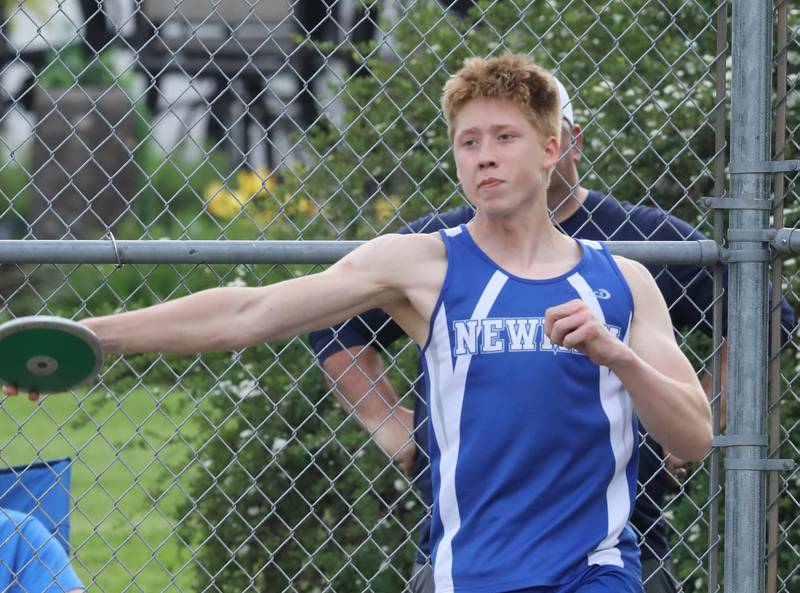 Newman's George Jungerman throws the discus in Friday's Three Rivers Meet at Princeton.