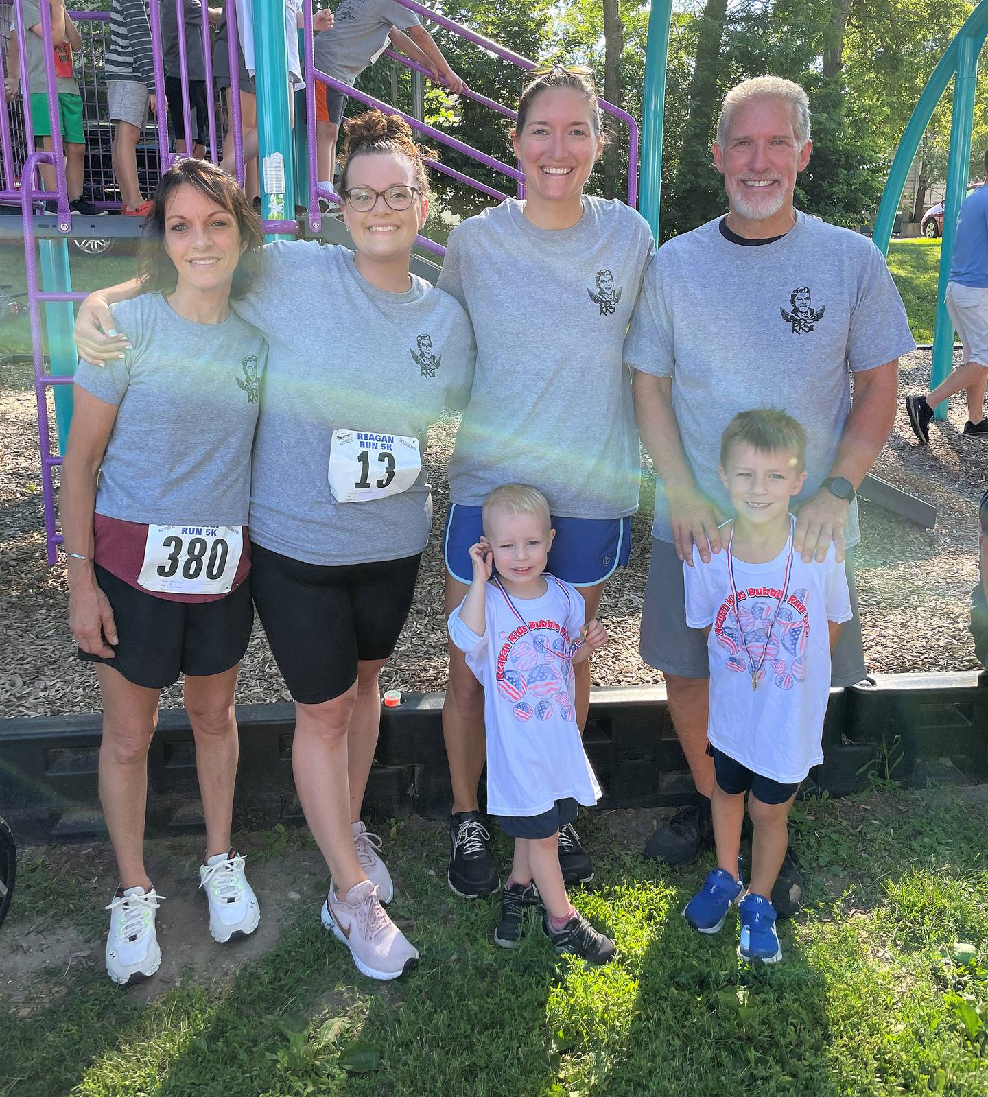 Stephanie Schmalzer (second from right) has run in every Reagan Run except the first one, and through the years has convinced other family members to join her. Last year, she ran with her aunt, Sady Forbes (left); her cousin, Lindsey Richards; and her father, Steve Bailey (right). Stephanie's sons, Owen and Finn Schmalzer, are also pictured; both ran in the Kids Fun Run last year.
