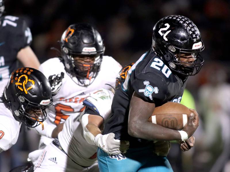 Woodstock North’s David Randecker runs the ball against Freeport in first-round IHSA Playoff football action on Saturday, Nov. 2, 2024 at Woodstock North High School in Woodstock.