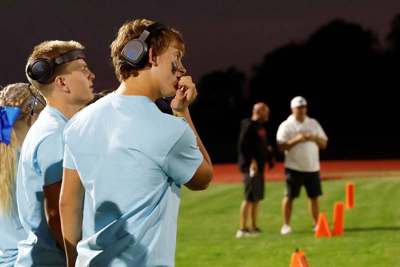 Erie High School sophomores Sawyer Copeland (left) and Evan Steimle watched anxiously Wednesday, Oct. 1, 2025, from the sidelines as their team of sophomore girls competed against the senior class of girls in the championship game of the annual EHS Powder Puff football tournament. The girls of each class formed a team and the boys of each class took on the roles of coaches. The Senior Class of 2026 took home the trophy.