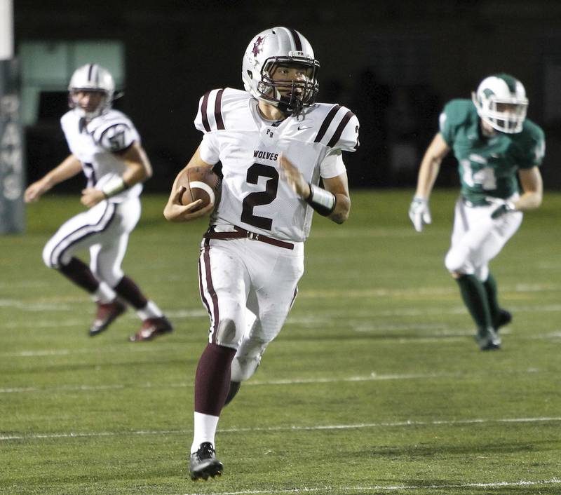 Prairie Ridge’s Samson Evans heads for a touchdown on a punt return in the second quarter at Grayslake Central. Prairie Ridge won 56-0.