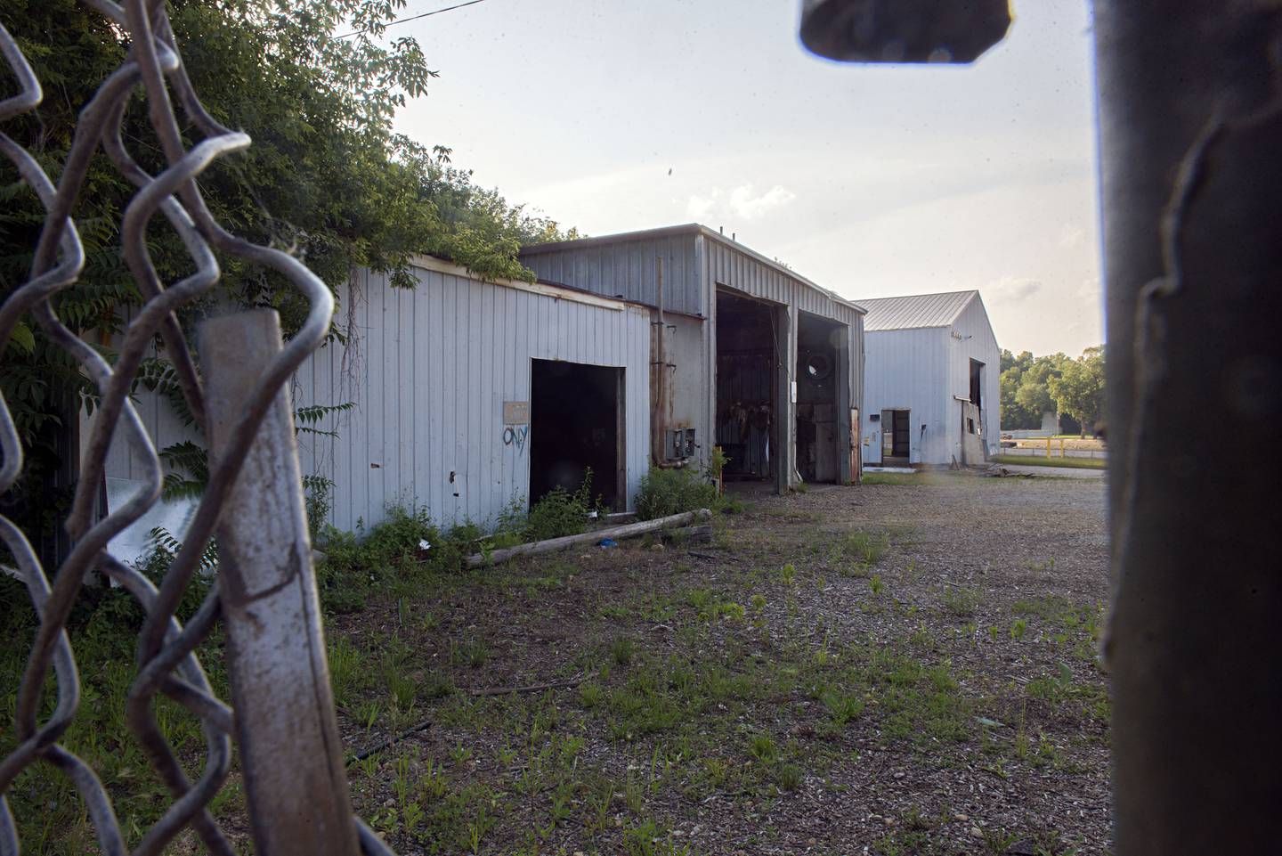 Local officials hope to raze the remaining buildings on the former DIxon Iron and Metal yard along the Rock River in Dixon.