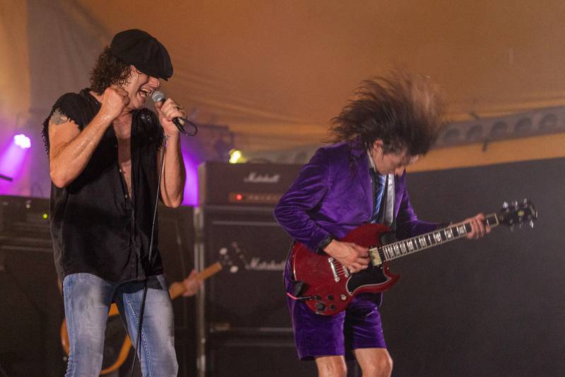 (left to right) Bobby Lee Stamper and Kyle Lapato of Thunderstruck perform at the annual Cops for Cancer event on Friday, July 25, 2025, at Cerri Memorial Park in Cedar Point.