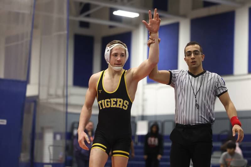 Joliet West’s Carson Weber wins against Romeoville’s TJ White in a dual meet on Thursday, Dec.14th, 2023 in Romeoville.