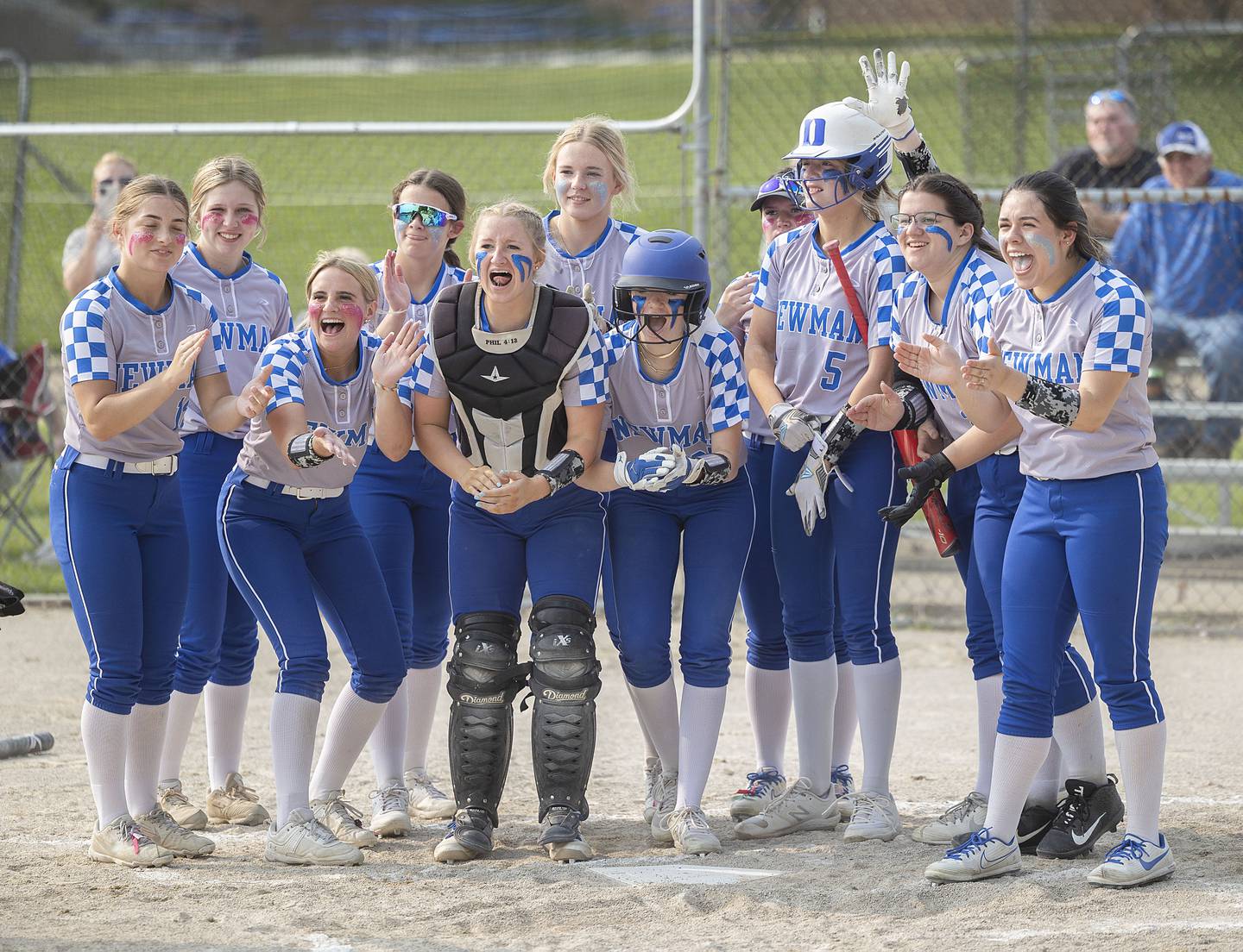 Teammates celebrate Newman’s Madison Duhon’s two-run homer against Putnam County Thursday, May 18, 2023.