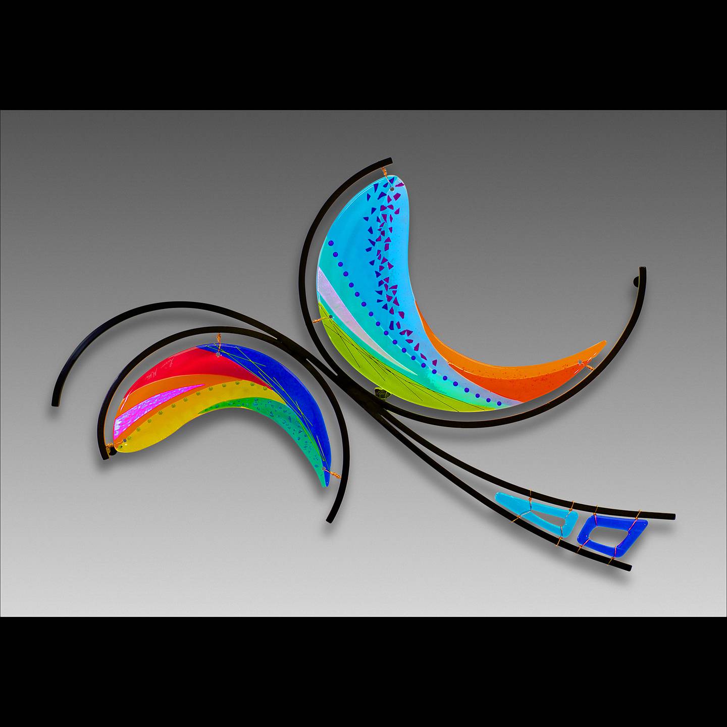 Fused glass art created by Georgia artist Lisa Cote involves layering glass and using multiple kiln firings to melt them together. Cote is among some 80 artists whose work will be displayed during the 20th Geneva Arts Fair July 23-24 on Third Street.