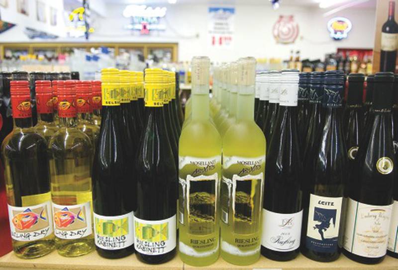 Spirt and wine bottles on the selves at the Beverage Store in Rock Falls will become a little more as Illinois new liquor tax comes into effect.