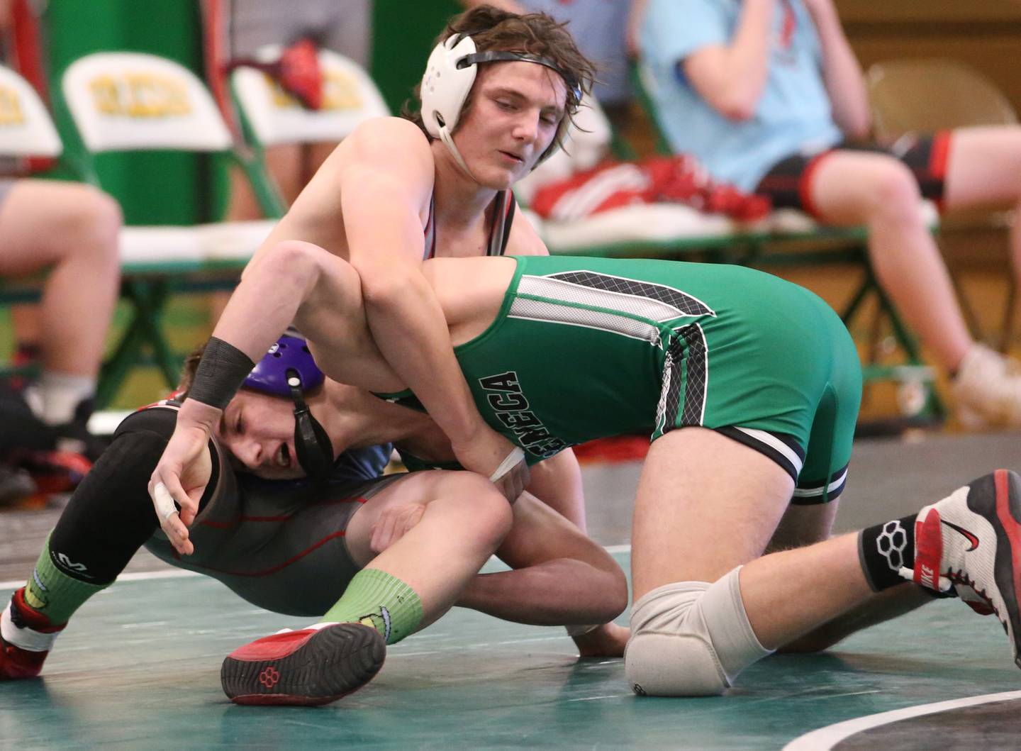 Ottawa's Wyatt Reding wrestles Seneca's Asher Hamby in the 160 weight class during a meet on Monday, Jan. 30, 2023 at Seneca High School.