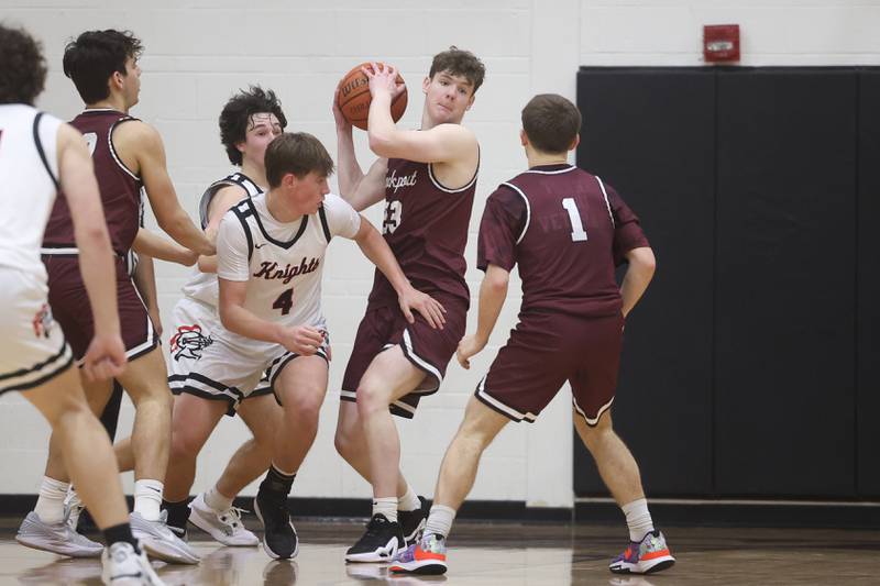 Lockport’s Collin Miller secures a rebound against Lincoln-Way Central on Tuesday, Jan. 23rd, 2024 in New Lenox.
