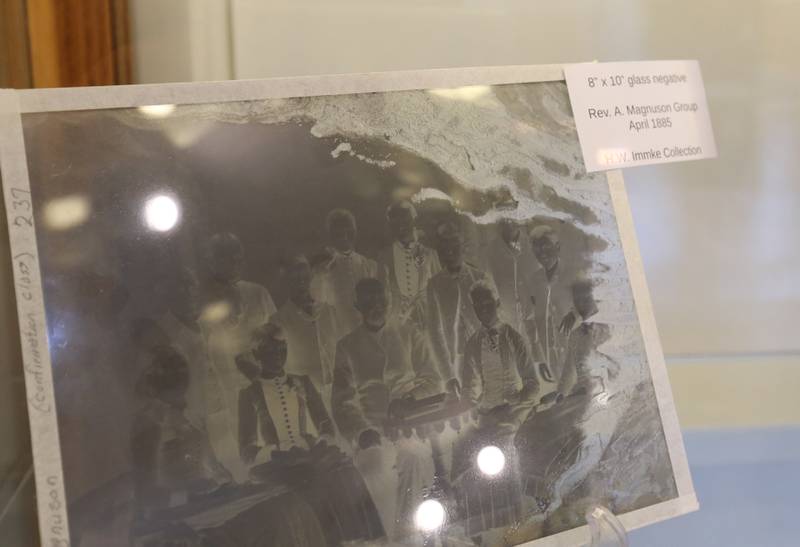 A view of a 8x10 glass plate negative from  Immke on Friday, May 1, 2026 at the Bureau County Historical Society in Princeton. Immke's seft portrait is on the left.