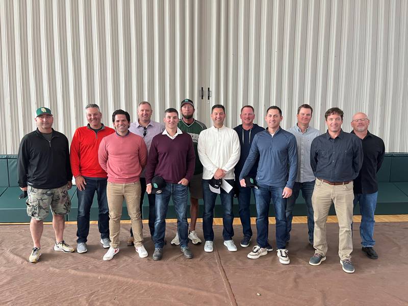 The 1992 Bruins State Baseball team huddles up one more time after being inducted into St. Bede’s Athletic Hall of Fame Saturday morning. Team members include: Jason Bernabei, John Donahue, Pat Dooley, Christian Gimochio, Tim Maciejewski, Dave McGunnigal, Daryl Micheli, Kevin Micheli, Chris Negro, Jim Payne, Mike Perona, Neil Piacenti, Sean Riordan, Andy Zelenski, Joe Zelenski and coaches Randy Gunia and John Bellino.