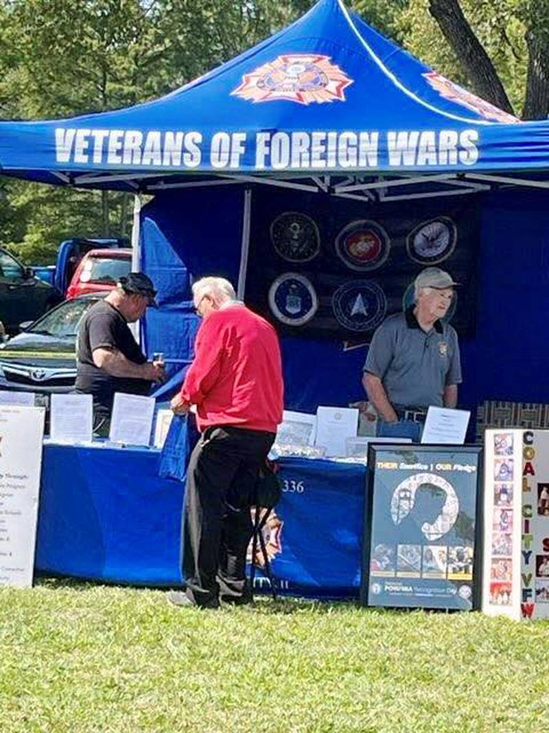 Adjutant and Quartermaster Keith Roseland advises vets about their benefits at the Operation Firm Handshake event.