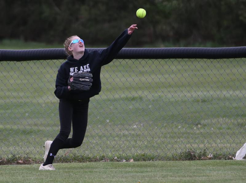 Flanagan-Cornell/Woodland's Jaylei Leininger throws the ball into the infield on Tuesday, May 2, 2023 at Woodland High School.