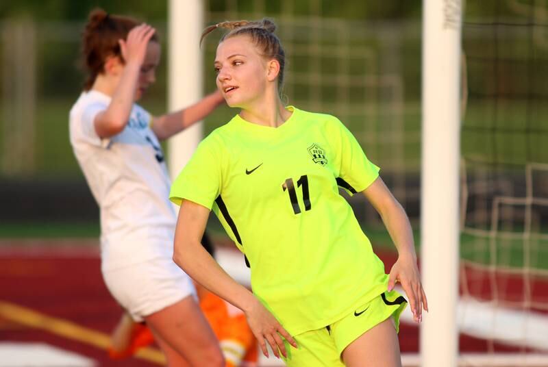 Richmond-Burton’s Margaret Slove heads away from the goal after scoring against Willows in Class 1A Sectional title soccer action at Richmond Friday night.