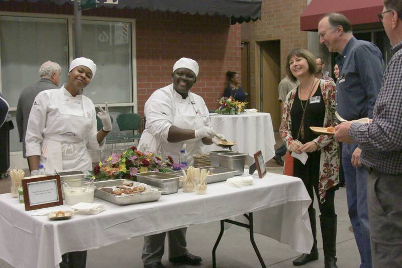 College of DuPage Culinary chefs and guests enjoy a past Harvest Against Hunger event.