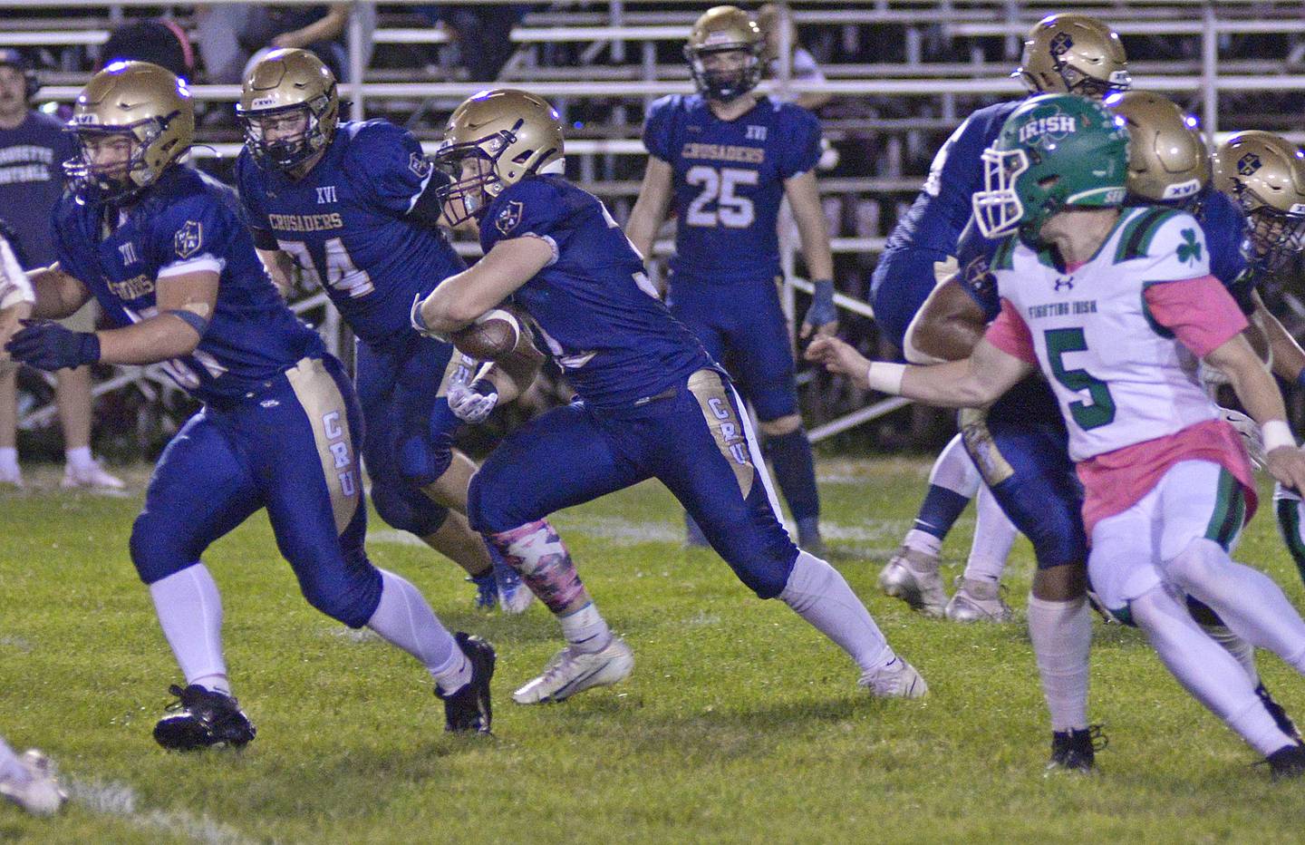 ollowing his blockers, Marquette’s Grant Dose pulls away from Seneca’s Avery Phillips in the 2nd quarter Friday at Marquette.