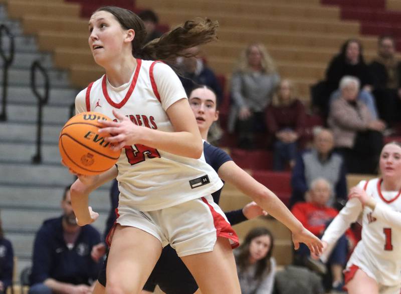 Huntley’s Evie Freundt makes a move for the hoop against Cary-Grove in varsity girls basketball on Monday, Feb. 2, 2026, at Huntley High School in Huntley.