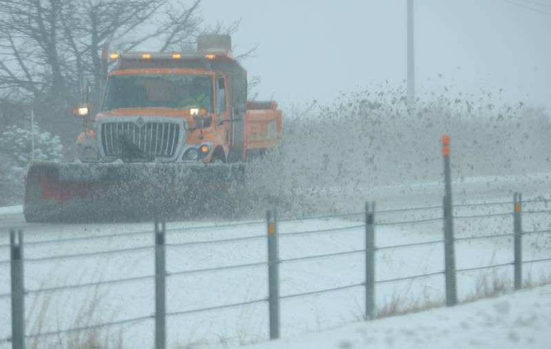 A slow plow removes snow along Interstate 80 on Saturday, Nov 29, 2025 between Utica and Ottawa.