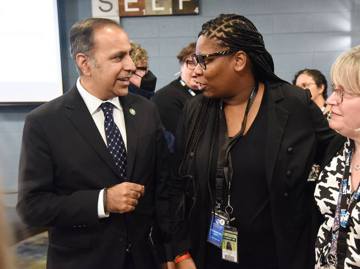 Congressman Raja Krishnamoorthi, left, talks with Martina Smith, Community School District 300's next superintendent, Friday, Jan. 20, 2023, during his visit to the Boys & Girls Clubs of Dundee Township's impact center at Perry Elementary School in Carpentersville.