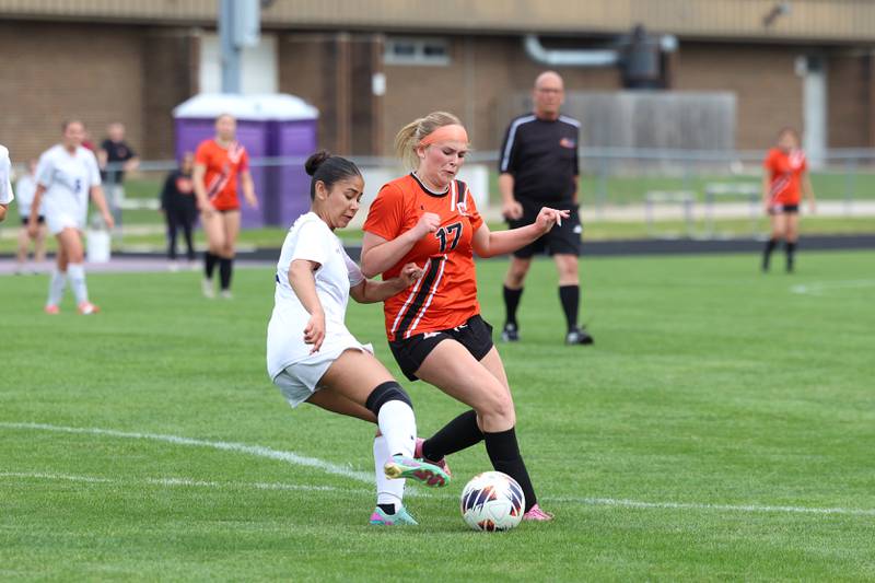 Peotone's Nayeli Horta defends a run by Beecher's Sydney Kettman during Peotone's 2-1 victory over Beecher in the Class 1A Manteno Regional championship on Friday, May 22, 2026.