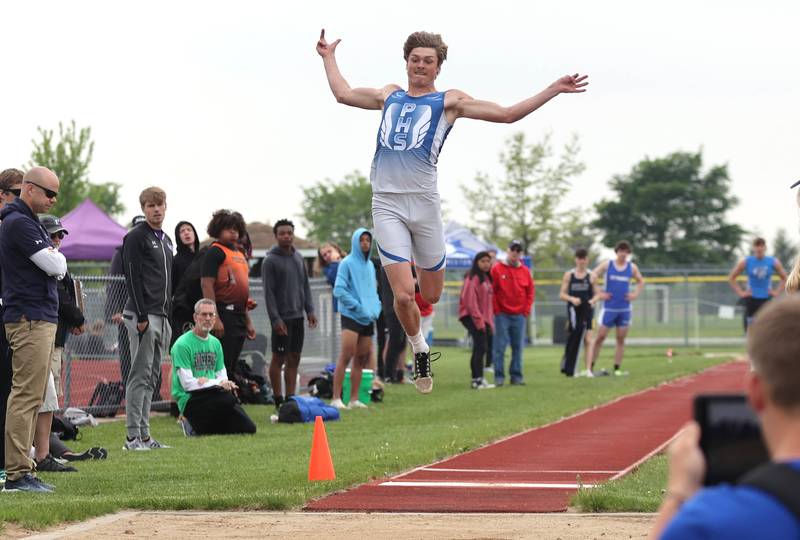 Princeton's Teegan Davis competes in the long jump Wednesday, May 18, 2022, at the Class 2A boys track sectional at Rochelle High School.