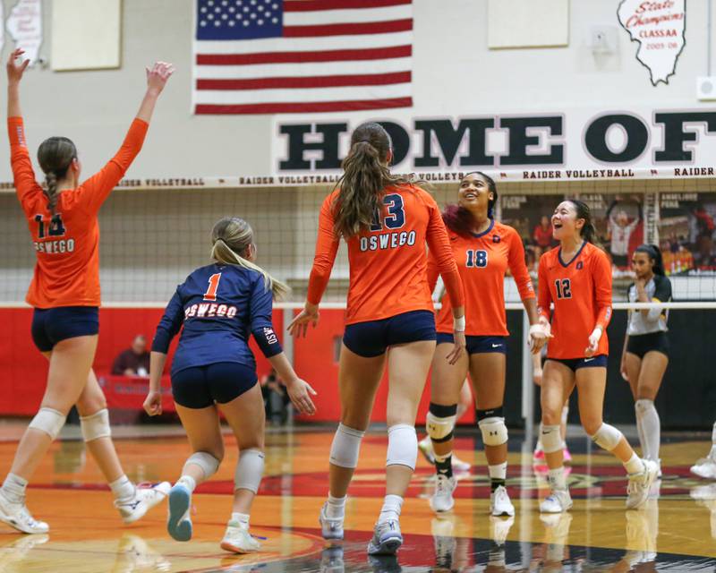 Oswego celebrates the win over Joliet West for the Class 4A Bolingbrook Sectional semifinal match.  Nov 5, 2024  in Bolingbrook.