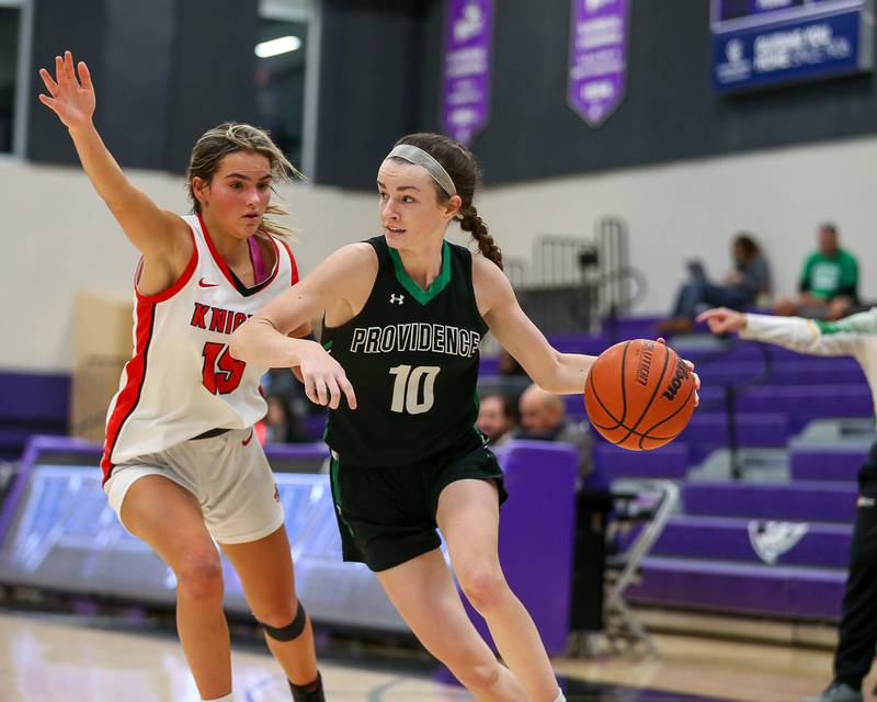 Providence's Molly Knight  (10) drives past the defense of Lincoln Way Central's Gianna Amadio (15) in the WJOL Tournament Championship game. Nov