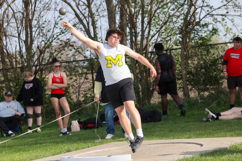 Bishop McNamara's Cale Hamilton throws shotput during the All-City meet at Kankakee High School on Monday, April, 28, 2025. Hamilton would claim second place with a distance of 14.24 m behind Bradley-Bourbonnais' Joel Morrical with 14.93 m.