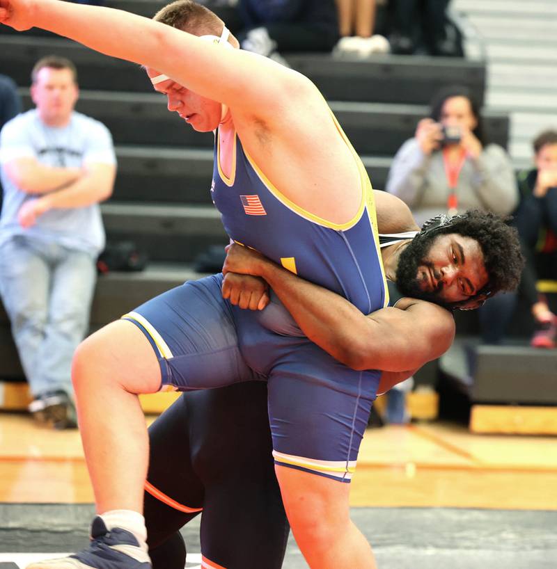 Nequa Valley’s Alex Marx tries to escape from DeKalb’s Neyemiah Ericson in their 285 pound semifinal match Friday, Jan. 20, 2023, during the DuPage Valley Conference wrestling tournament at DeKalb High School.