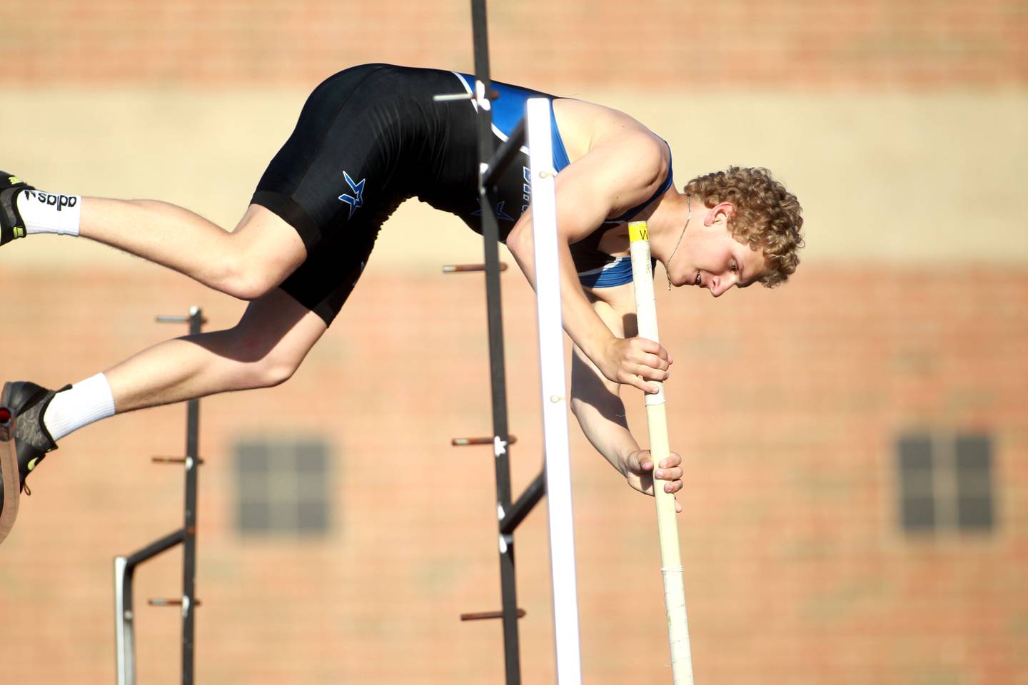 St. Charles North’s Bobby Guetthoff competes in the pole vault during the Kane County boys track and field championships on Friday, May 9, 2025 at St. Charles North.