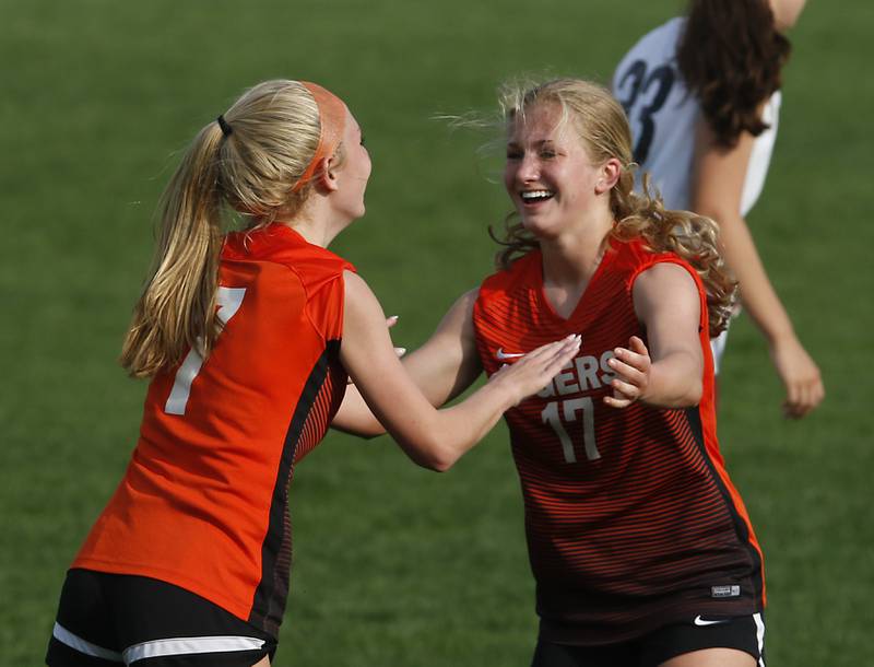 Crystal Lake Central's Sam Sander celebrates a goal with her teammate, Olivia Anderson, during a Fox Valley Conference soccer match Tuesday, May 10, 2022, between Crystal Lake Central and Prairie Ridge at Crystal Lake Central High School.