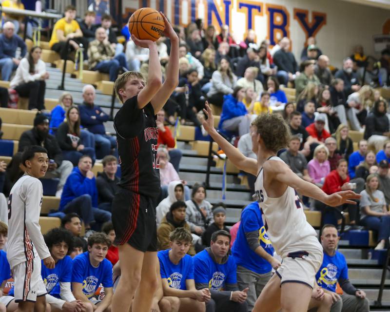 Yorkville's Joey Jakstys (32) shoots a jump shot during their basketball game between Yorkville at Oswego, Feb 7, 2026 in Oswego.