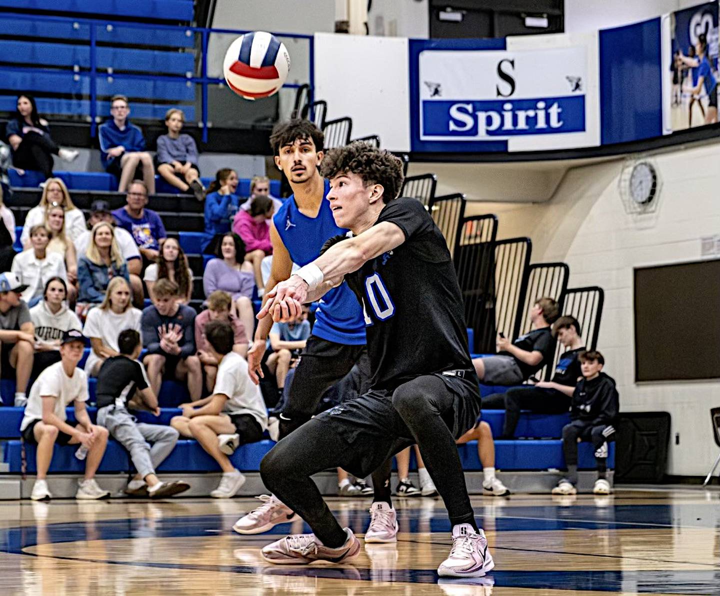 Matthew Muehlnickel of Lincoln-Way East digs a shot earlier this season.