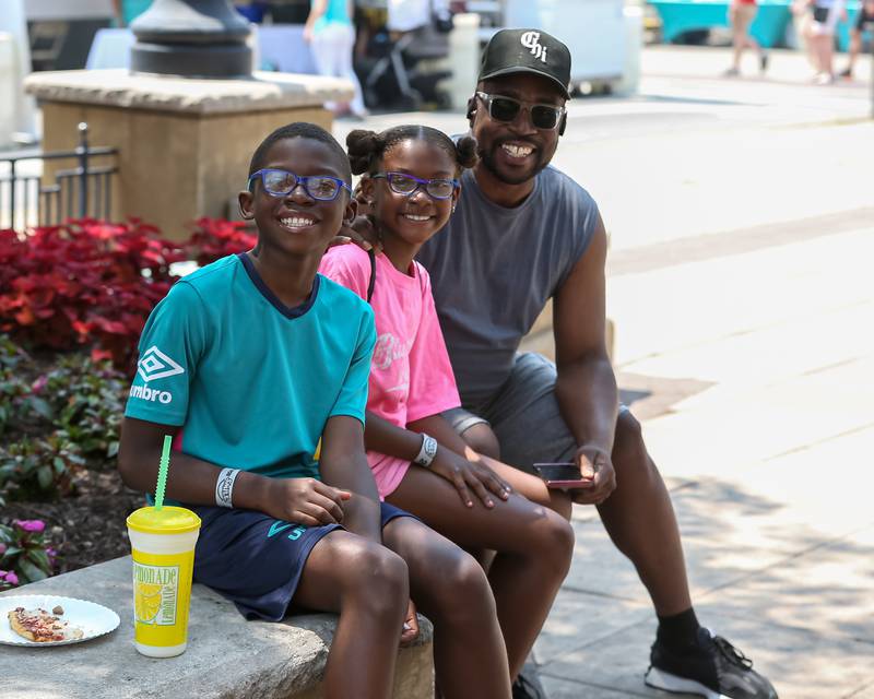 Wendell Spruill (R) with Willow and CJ (L) at the Downers Grove Rotary GroveFest in downtown Downers Grove. June 24, 2023.