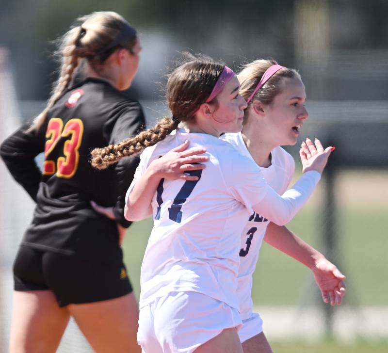 Oswego East’s Anya Gulbrandsen, right, celebrates her first-half goal against Batavia with teammate Riley Gumm, left, who assisted on the play, during a girls soccer match on Saturday, March 23, 2024 in Batavia.