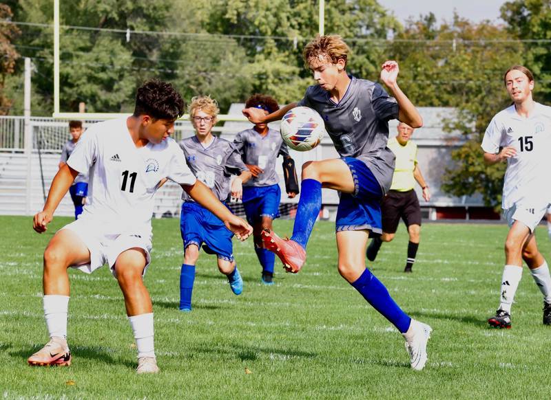 Princeton's Tyler VanDeventer takes control of the ball in Saturday's regional quarterfinal soccer match vs. Stanford Olympia at Bryant Field. The Tigers won 6-2.
