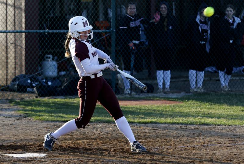 Marengo's Josephine Christiansen hits a home run during a nonconference softball game against Antioch on Monday, March 31, 2025, at Marengo High School.