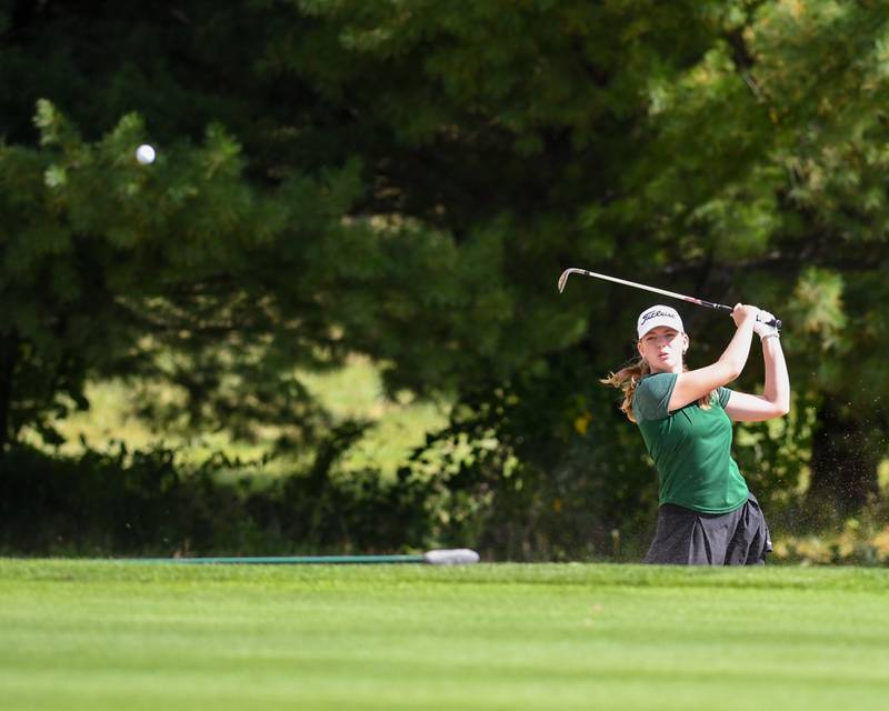 Kaylee Adelmann of Plainfield Central watches her chips shot onto the green during the Southwest Prairie conference meet on Wednesday Sept. 24, 2025, held at Blackberry Oaks Golf course in Bristal.