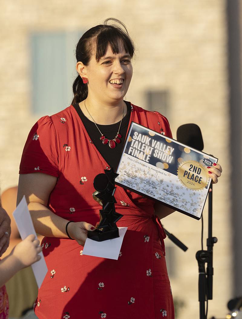 Elizabeth Megill smiles after taking second Thursday, Aug. 9, 2024 in the finals of Rock Falls Tourism’s Sauk Valley Talent Competition.