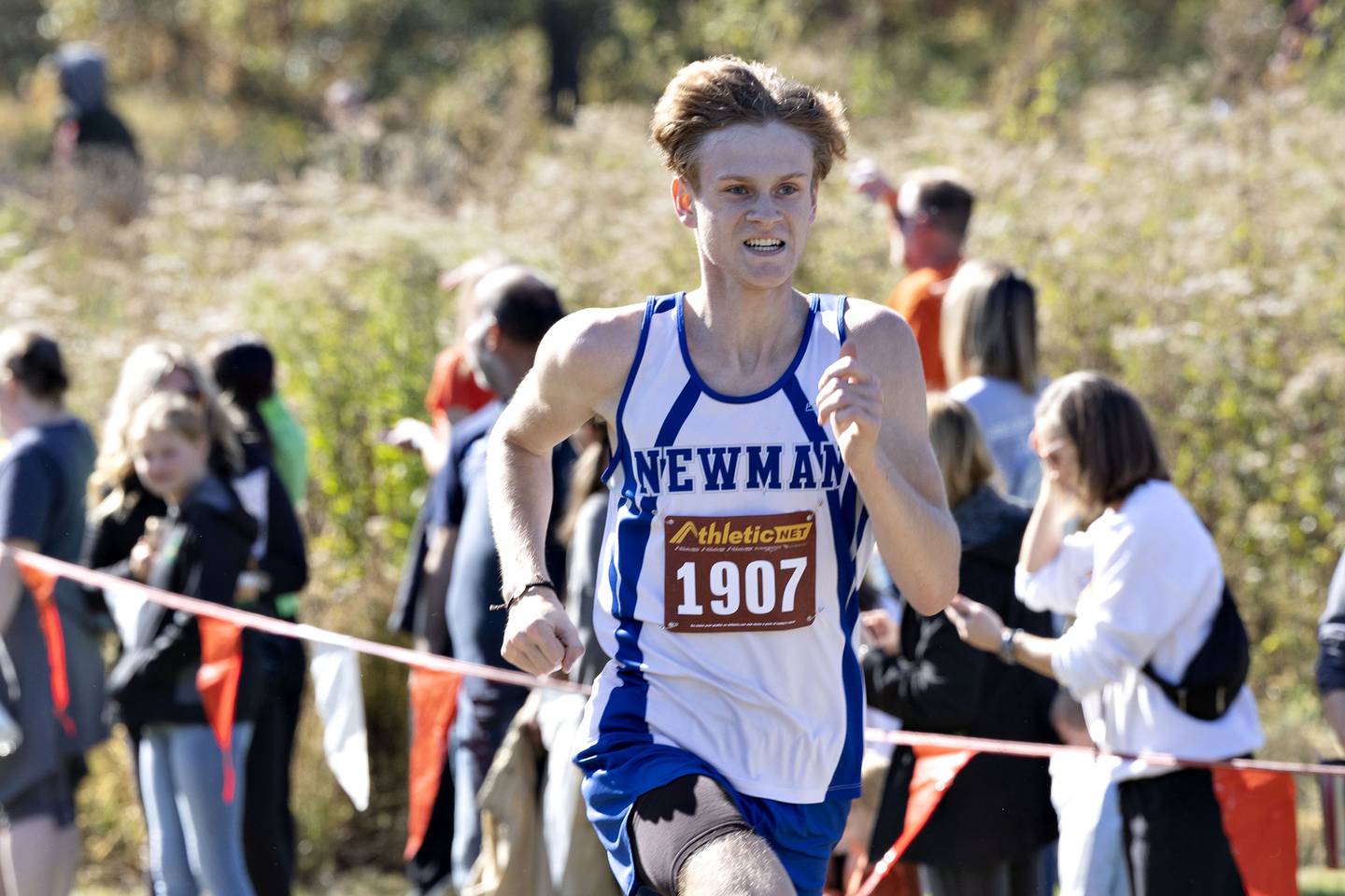Newman’s Lucas Simpson takes 17th during the boys varsity race at the Amboy Columbus Day Invitational Monday, Oct. 10, 2022.