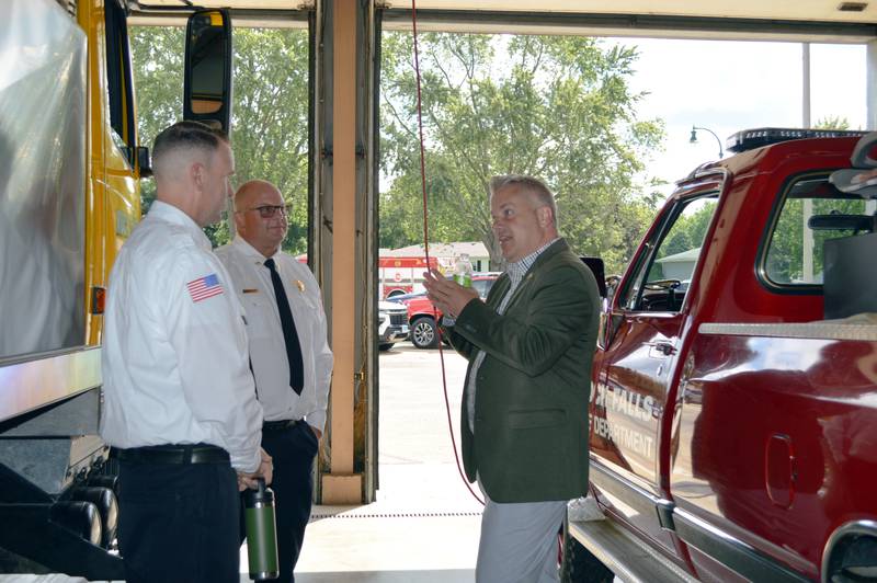 U.S. Rep. Eric Sorensen, D-Rockford (right), speaks with Rock Falls Fire Department Chief Ken Wolf III (center) and Deputy Chief Kyle Sommers on Friday, Aug. 9, 2024. Sorensen met with Rock Falls and Sterling fire department leaders regarding his request to Congress for $1.5 million in federal funding to help the departments build a new fire training center.