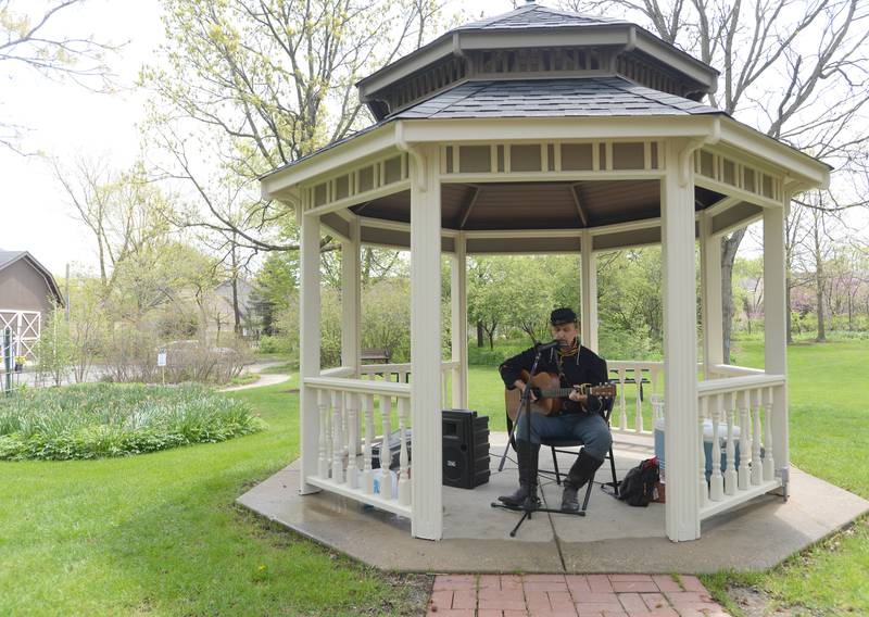 David Corbett sings songs of the Civil War during the Downers Grove Museum's Country in the Park Saturday May 6, 2023.