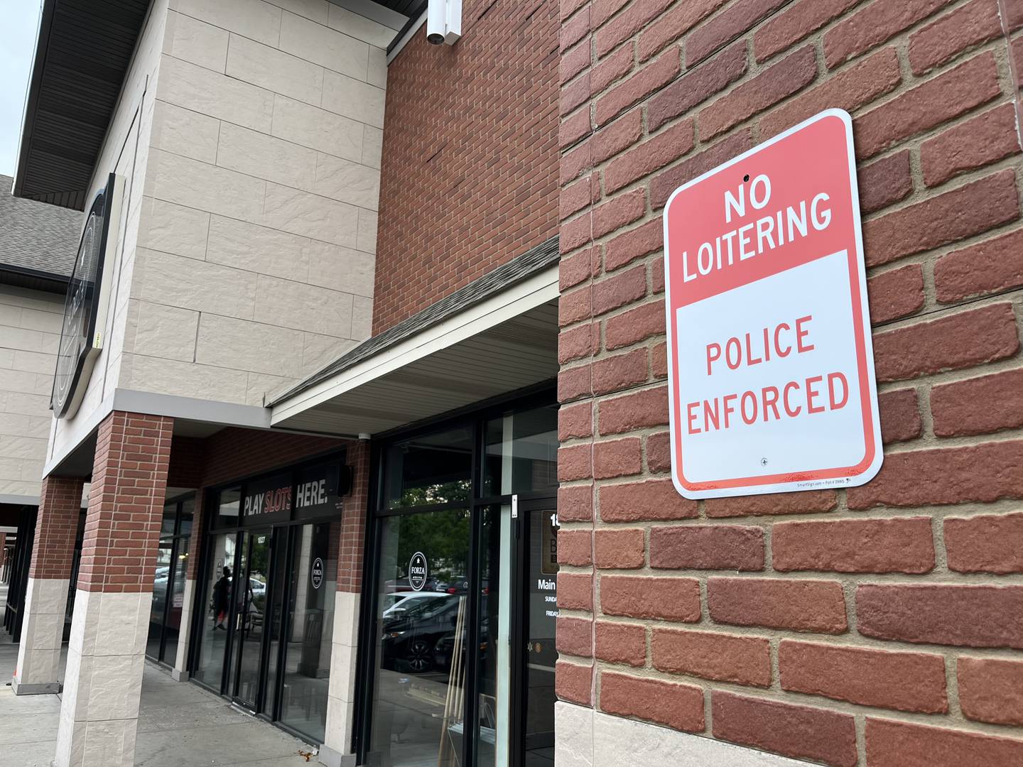 A no loitering sign on one of the pillars next to the entrance of Forza Table & Tap, 1827 Knapp St., Crest Hill, seen on Monday, July 11, 2022.