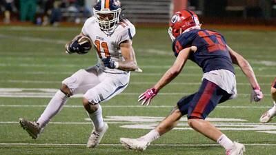 Mark Melton shoulders the load for short-handed offense, carries Oswego past West Aurora