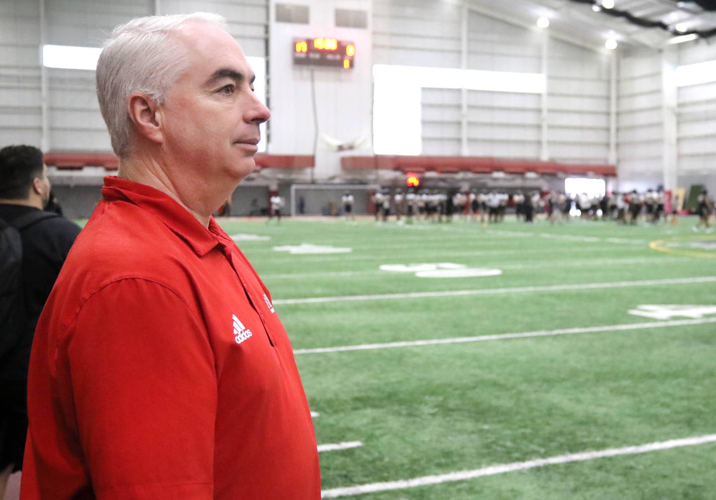 Phil Voorhis, Associate Athletic Director for Sports Medicine and Athletic Training at Northern Illinois University, watches for injuries during spring football practice Tuesday, March 26, 2024, in the Chessick Practice Center at NIU in DeKalb.