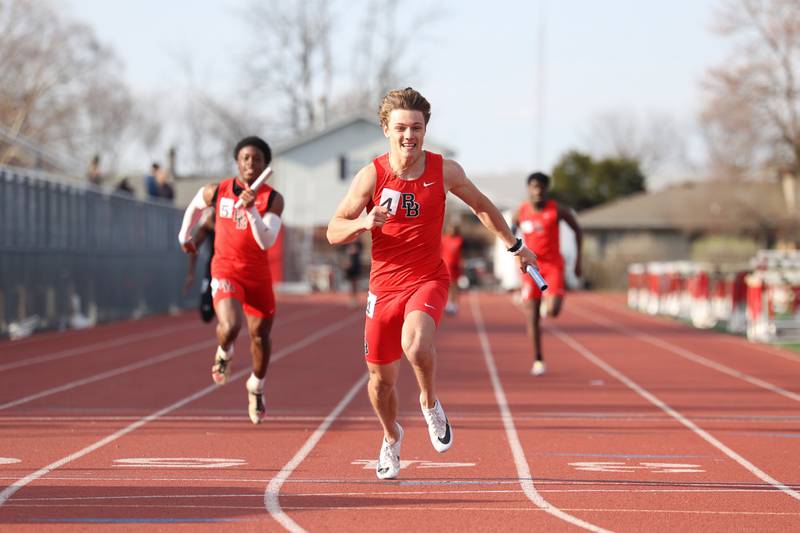 Bradley-Bourbonnais' Isaac Allison secures first place in the 100-meter relay during the Boilermaker Invite on Thursday, April 3, 2025.