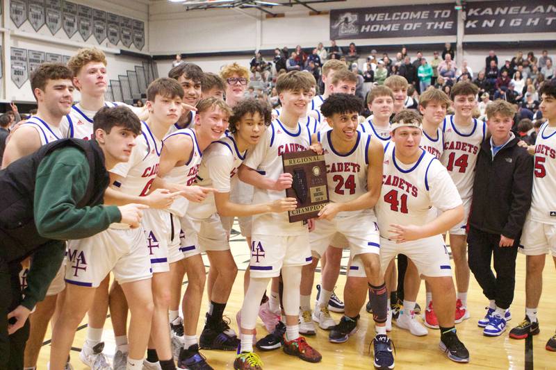 Marmion Academy celebrates the winning the Class 3A Regional Final at Kaneland on Saturday, Feb.25, 2023.