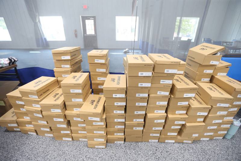 A view of a section of shoe boxes during the Shoes and Socks Giveaway on Saturday, Aug. 2, 2025 at the Second Story Teen Center in Princeton. A total of 1,250 socks were donated to give to kids in need.